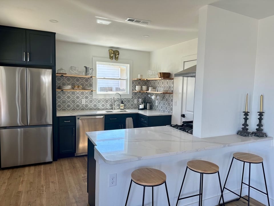 Full kitchen, open to the living room.