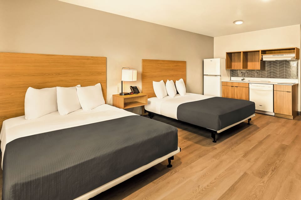 Studio Suite, 2 Queen Beds, Mobility Accessible, Non Smoking | Laptop workspace, WiFi (free), bed sheets