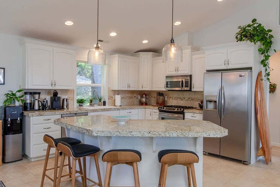 Spacious well-supplied kitchen awaits
