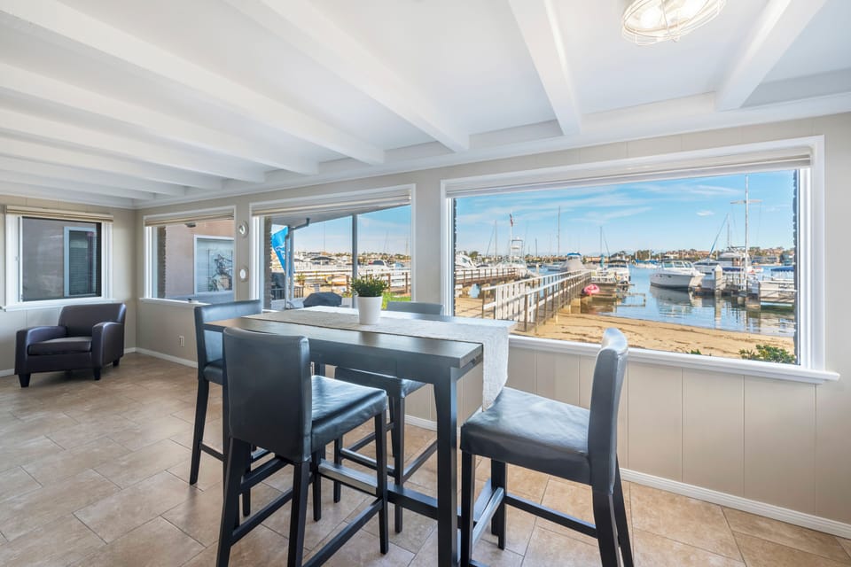Enjoy stunning waterfront views right from your dining table. (Unit B)