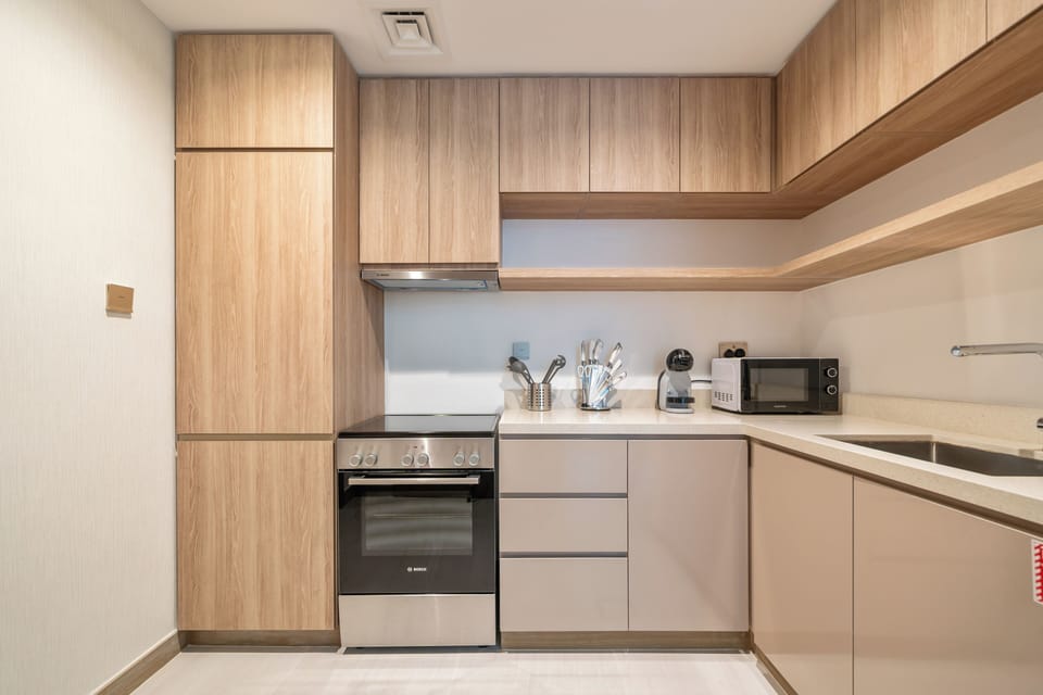 Apartment, Balcony, City View | Private kitchen | Espresso maker, electric kettle