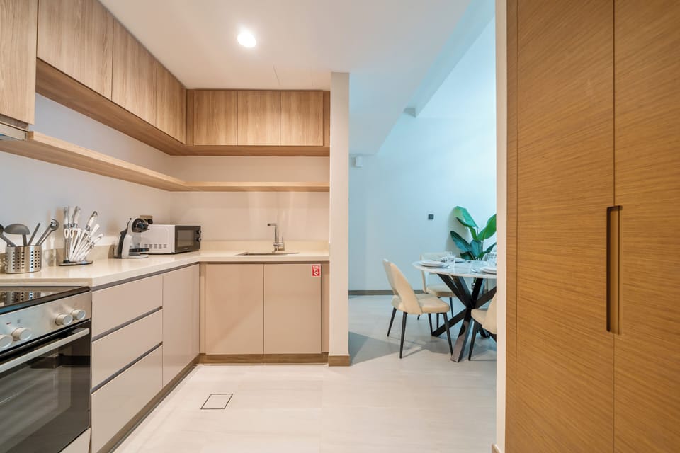 Apartment, Balcony, City View | Private kitchen | Espresso maker, electric kettle