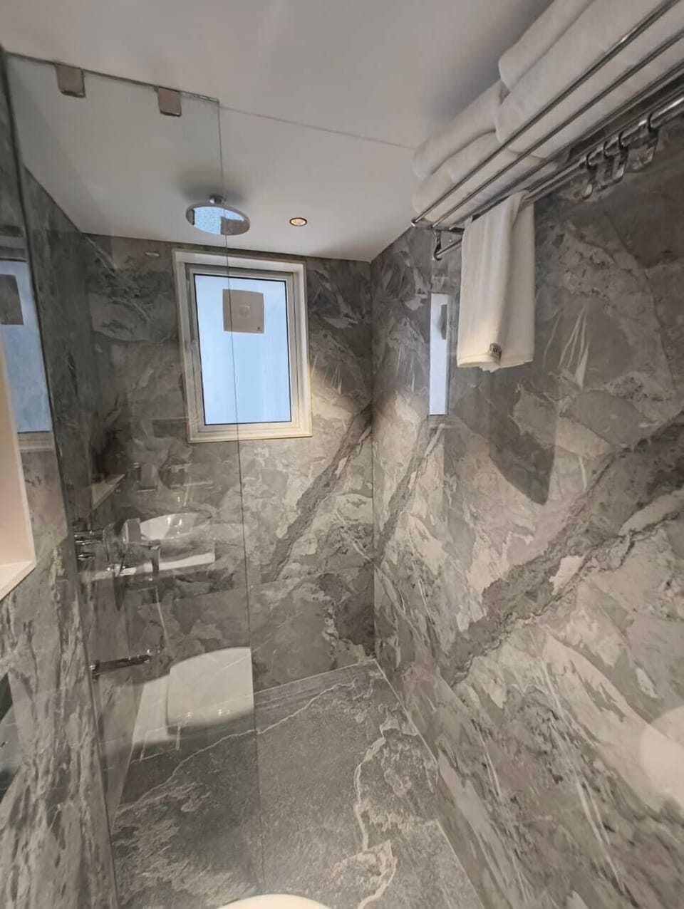 Premium Triple Room, City View | Bathroom | Shower, bidet, towels, soap
