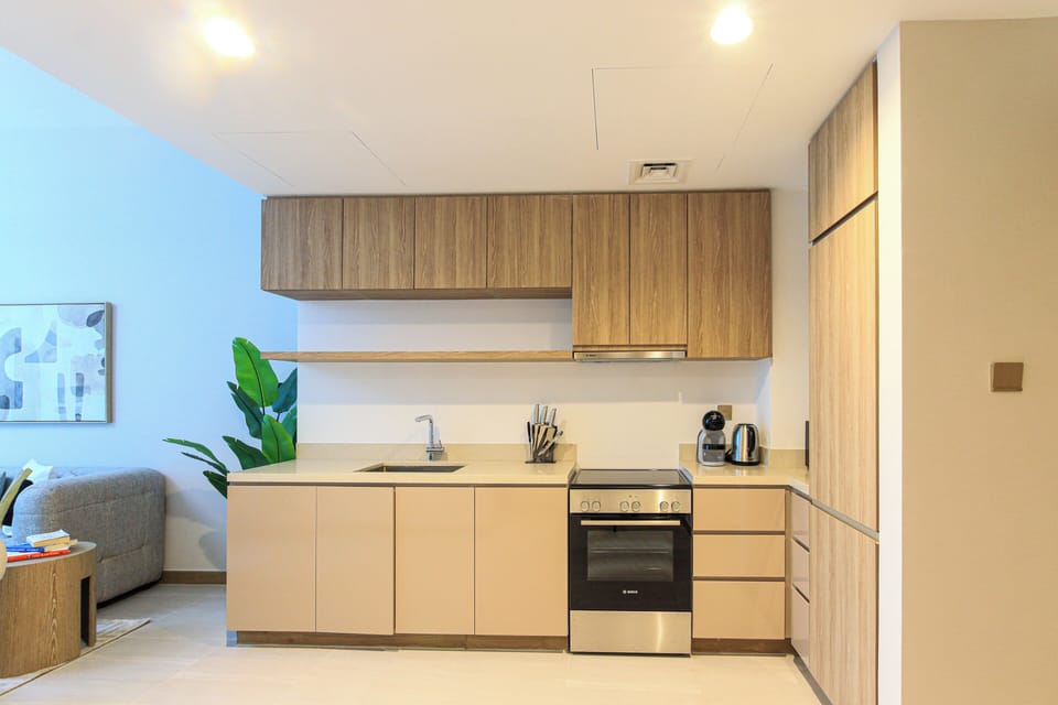 Apartment, Balcony, City View | Private kitchen | Espresso maker, electric kettle