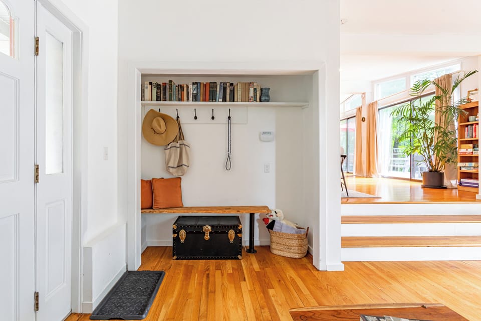 As you walk in, the charming entryway invites you to slip off your boots, hang up your bag, and start dreaming up your next adventure in this cozy retreat.