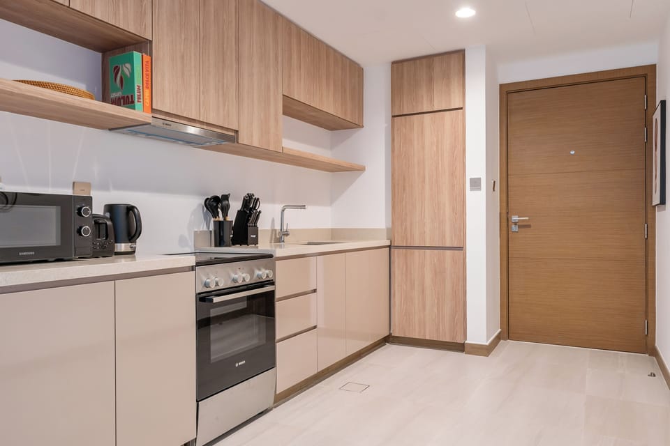 Apartment, Balcony, City View | Private kitchen | Espresso maker, electric kettle