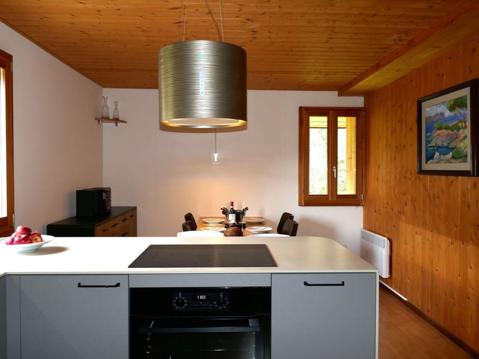 Furniture, Kitchen, Countertop, Flooring, Interior Design, Wood, Cabinetry, Kitchen Appliance, Light Fixture, Floor
