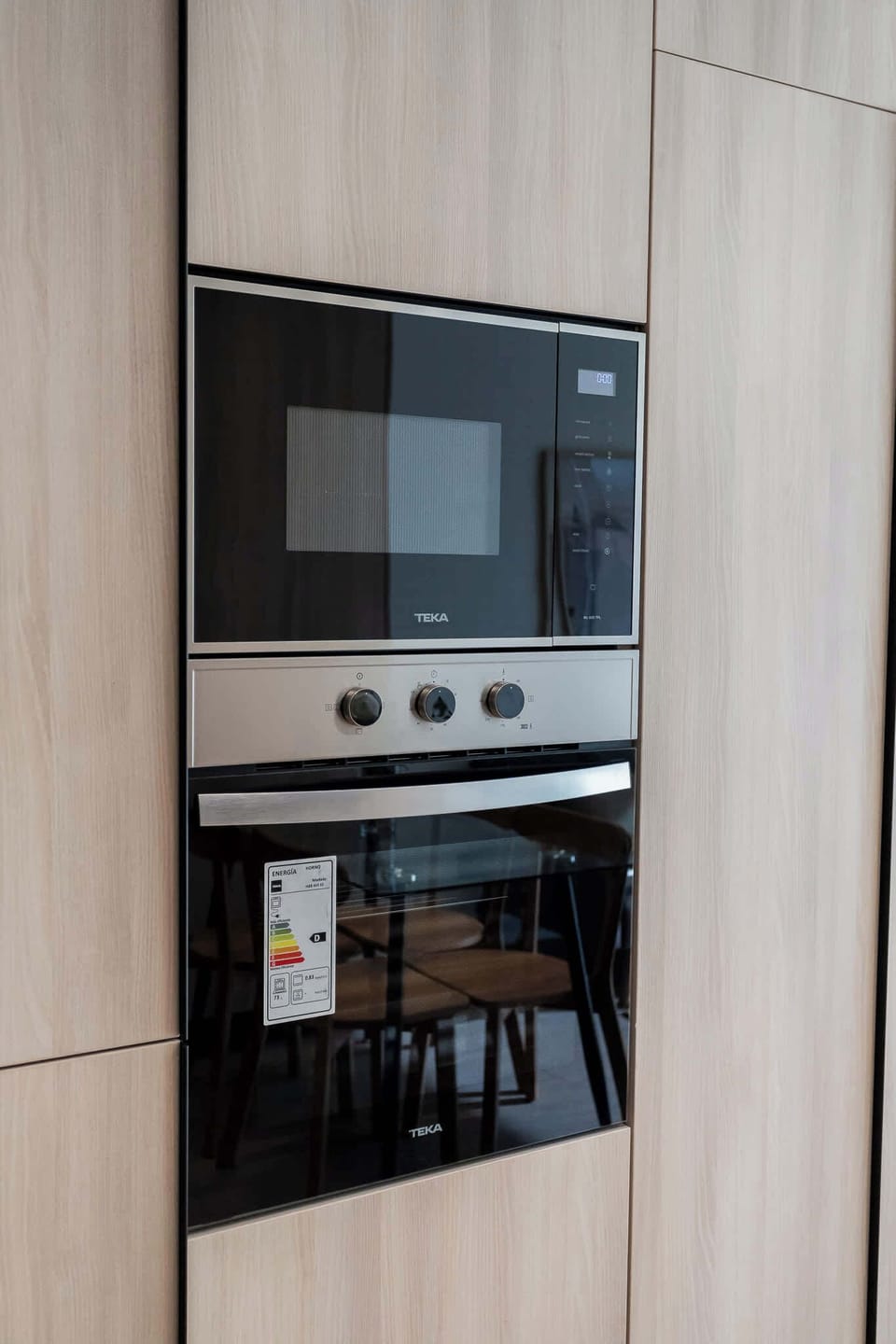 Modern kitchen with built-in appliances, perfect for cooking up family meals during your stay!