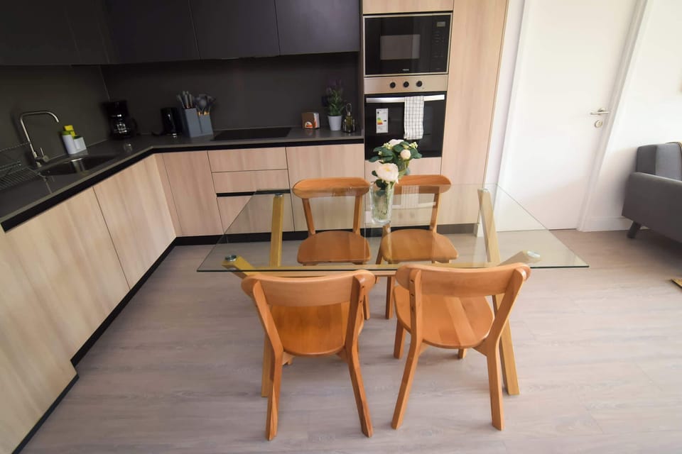 Stylish kitchen with modern amenities and a cozy dining area perfect for family meals.