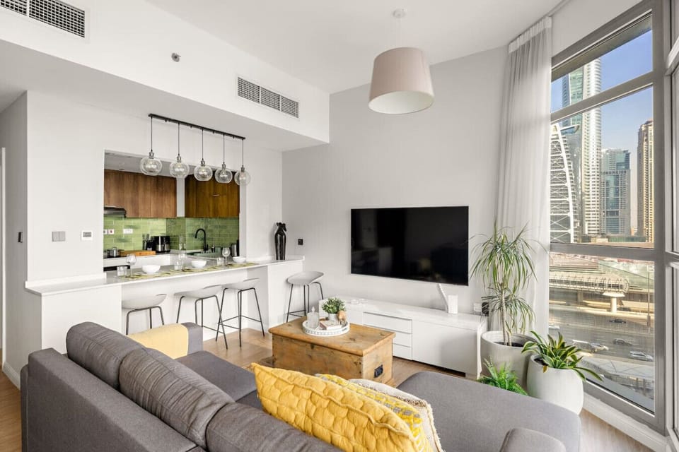 Living Room: Chic design with sweeping city views, perfect for relaxation or entertaining!
