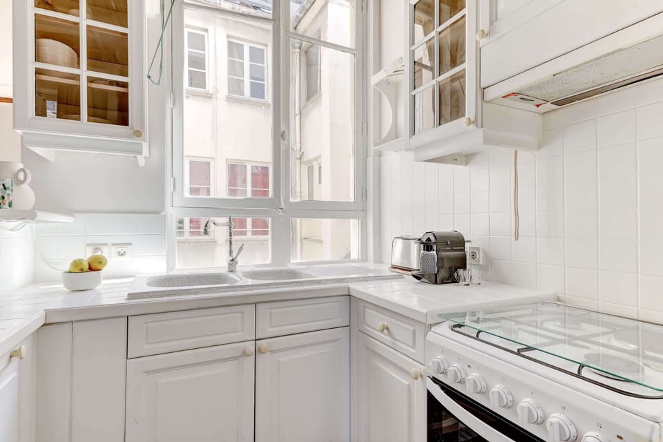 The kitchen is fully equipped to prepare a simple meal 