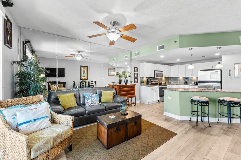 Open-concept living area with modern kitchen and comfortable seating for a relaxing stay.