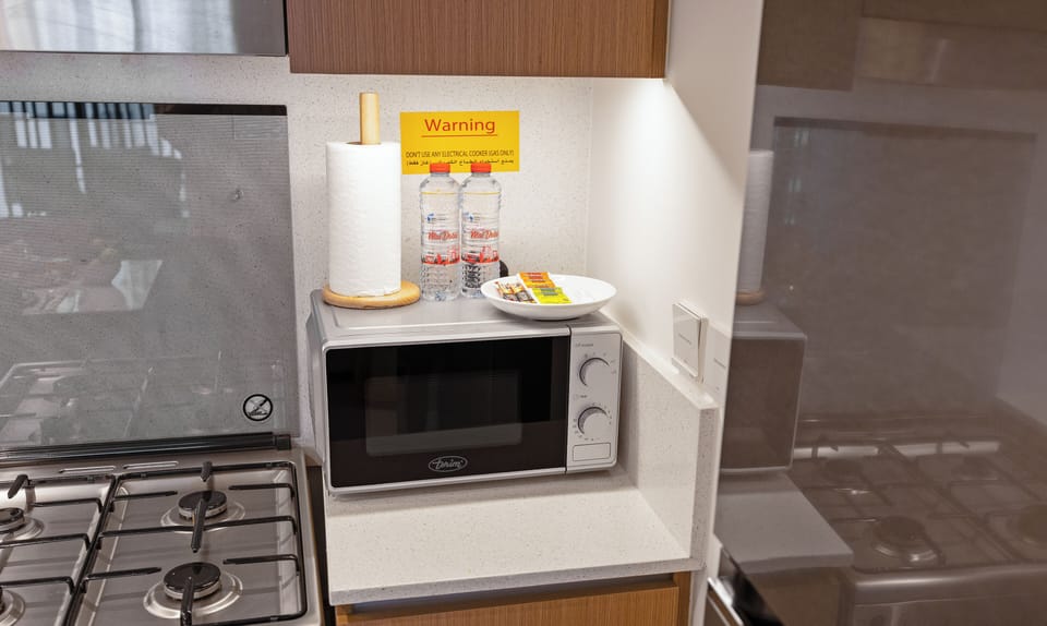 Apartment, Balcony, Courtyard View | Private kitchen | Fridge, microwave, oven, stovetop