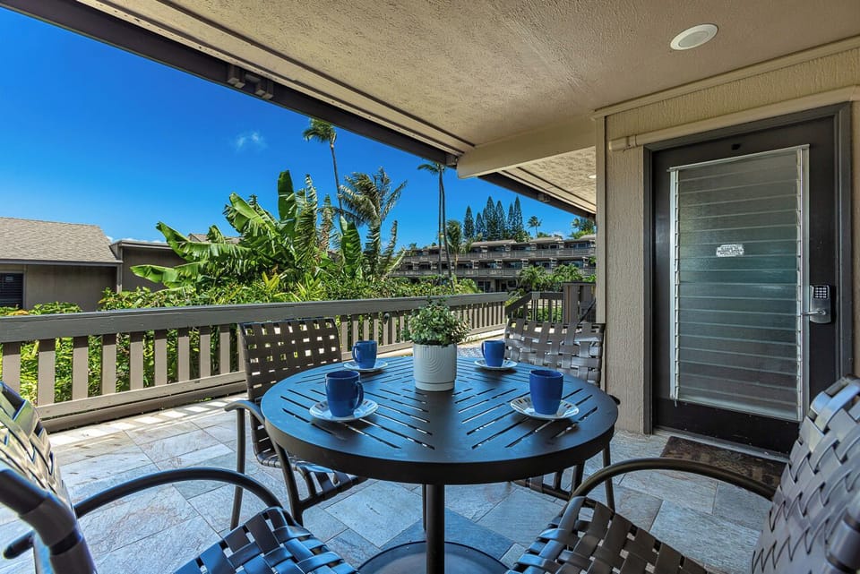 Enjoy meals outside at your lanai dining table for four.