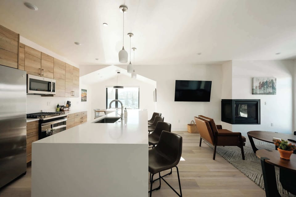 Kitchen, dining, and living areas