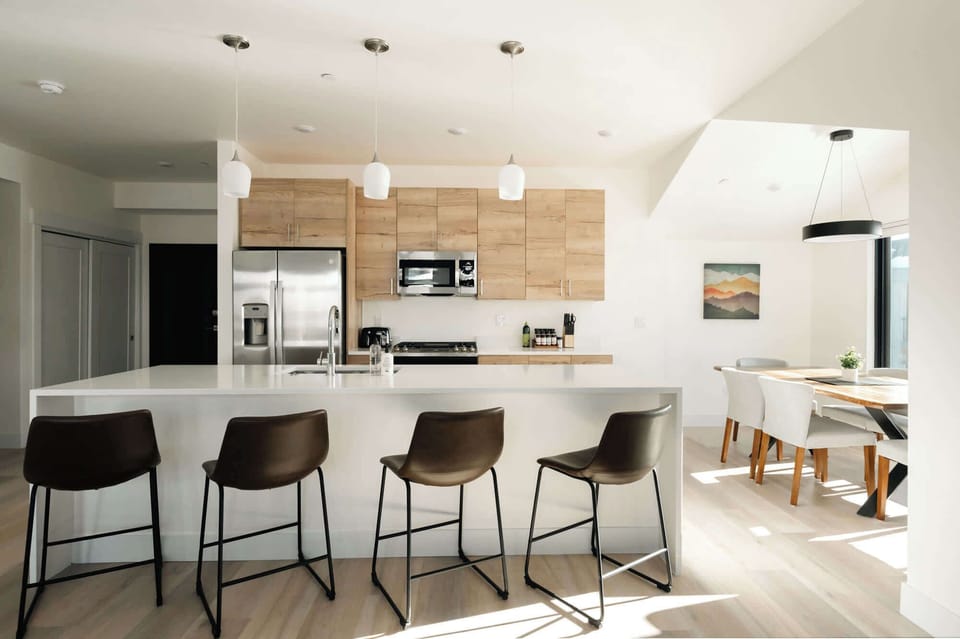Kitchen with island seating and dining area