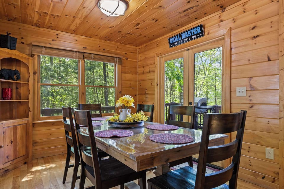 Dine in style with a seating for 6, offering the perfect setting to enjoy both great food and beautiful outdoor views.