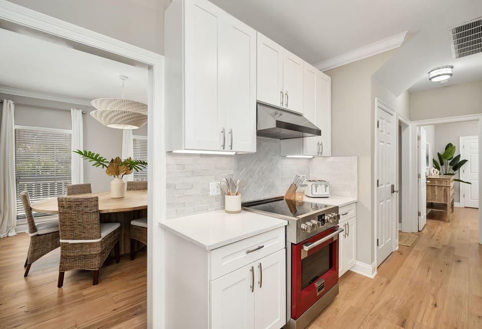 The kitchen is easily accessible from the dining and living areas.