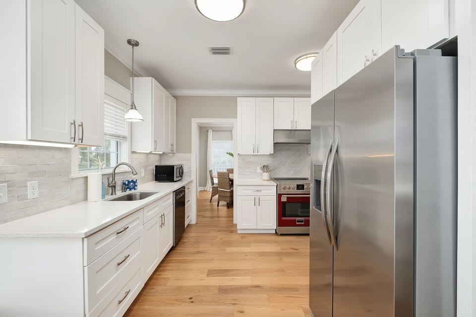 The kitchen is equipped with various appliances for a variety of cooking needs.