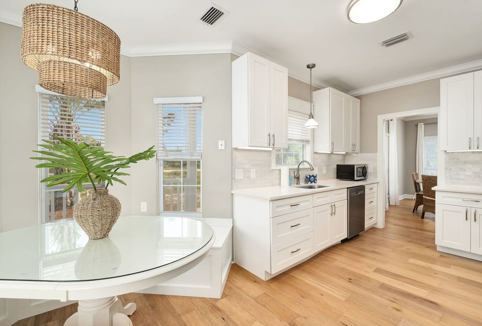 Crisp white cabinetry and accents radiate elegance.