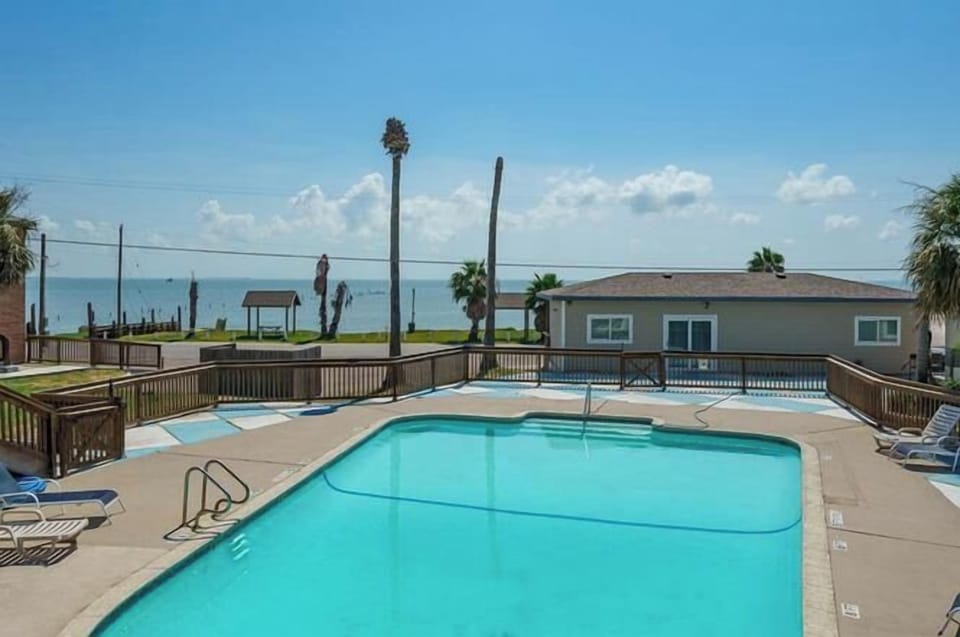 Your room is across the water. Pool behind your room. bbq pit on site