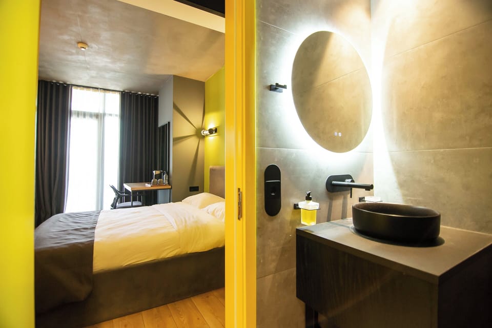 Standard Double Room, Balcony, City View | Blackout drapes, soundproofing, iron/ironing board, free WiFi