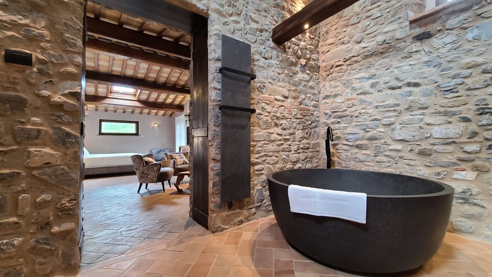 Suite, Vineyard View, Tower | Bathroom | Hair dryer, bathrobes, bidet, towels