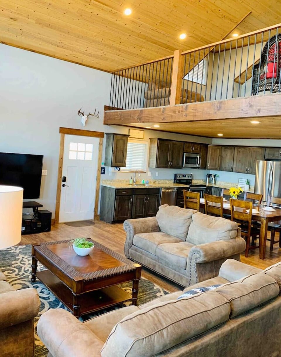 living room and kitchen access with an open floor