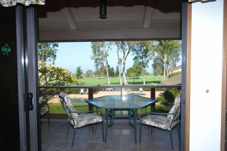 Start your day on the private lanai with a peaceful breakfast and panoramic views of the golf course.