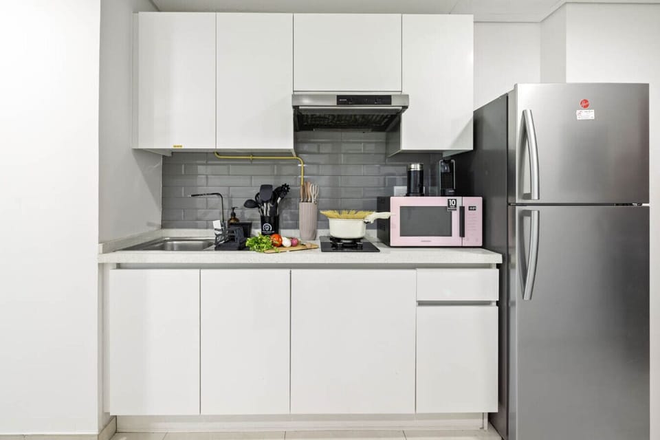 A functional kitchen and kitchenette, perfect for preparing meals with ease.