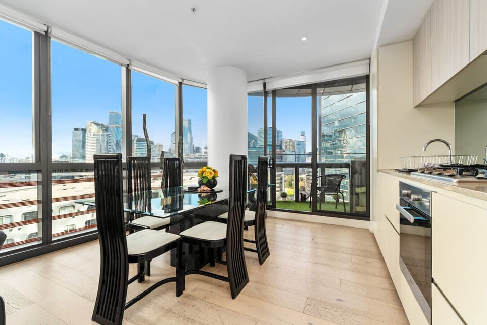 Open plan dining & kitchen flows out to the balcony