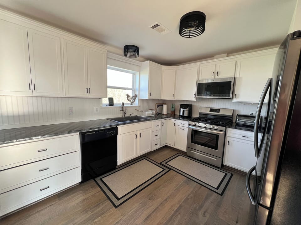 Enjoy a full kitchen with everything you need to cook and dine in comfort.
