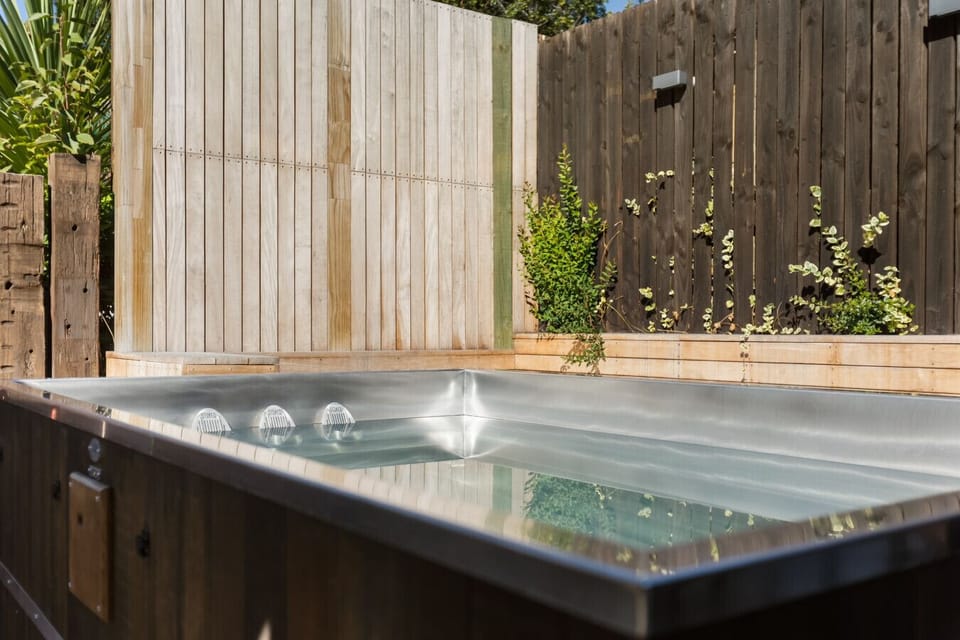 Relax in the hot tub in the shared outdoor facility