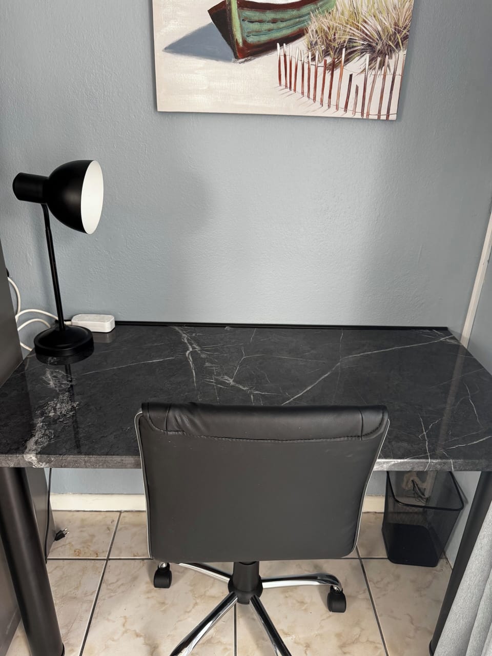 Cosy office space for work from home with desk and office chair.