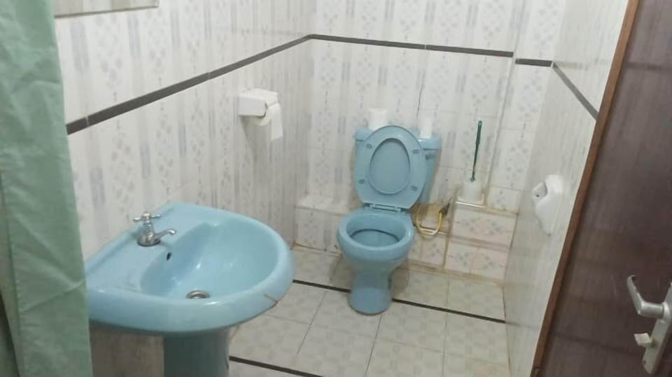 Shower, slippers, towels, soap