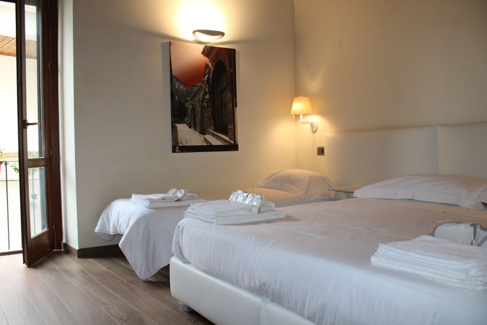 Comfort Triple Room, Non Smoking | In-room safe, desk, laptop workspace, blackout drapes