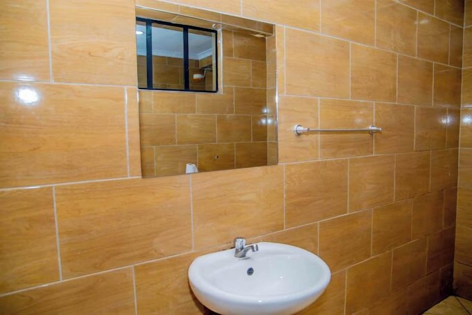 Shower, slippers, towels, soap