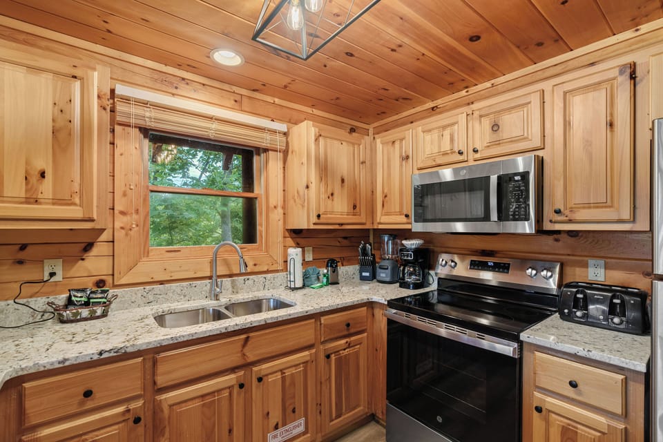 Fully equipped kitchen with coffee maker and Keurig.