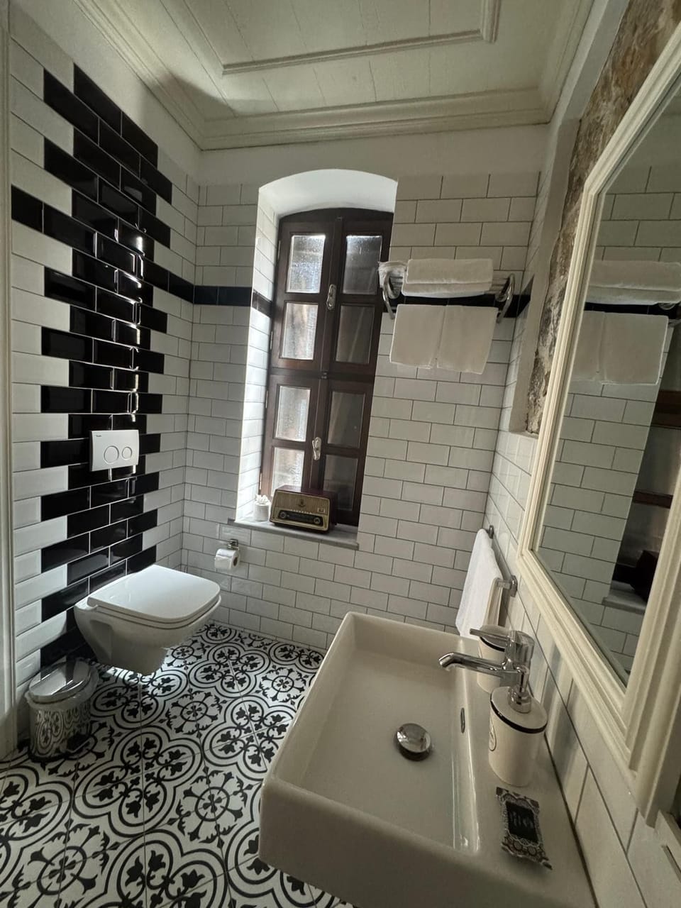 Shower, hair dryer, slippers, towels