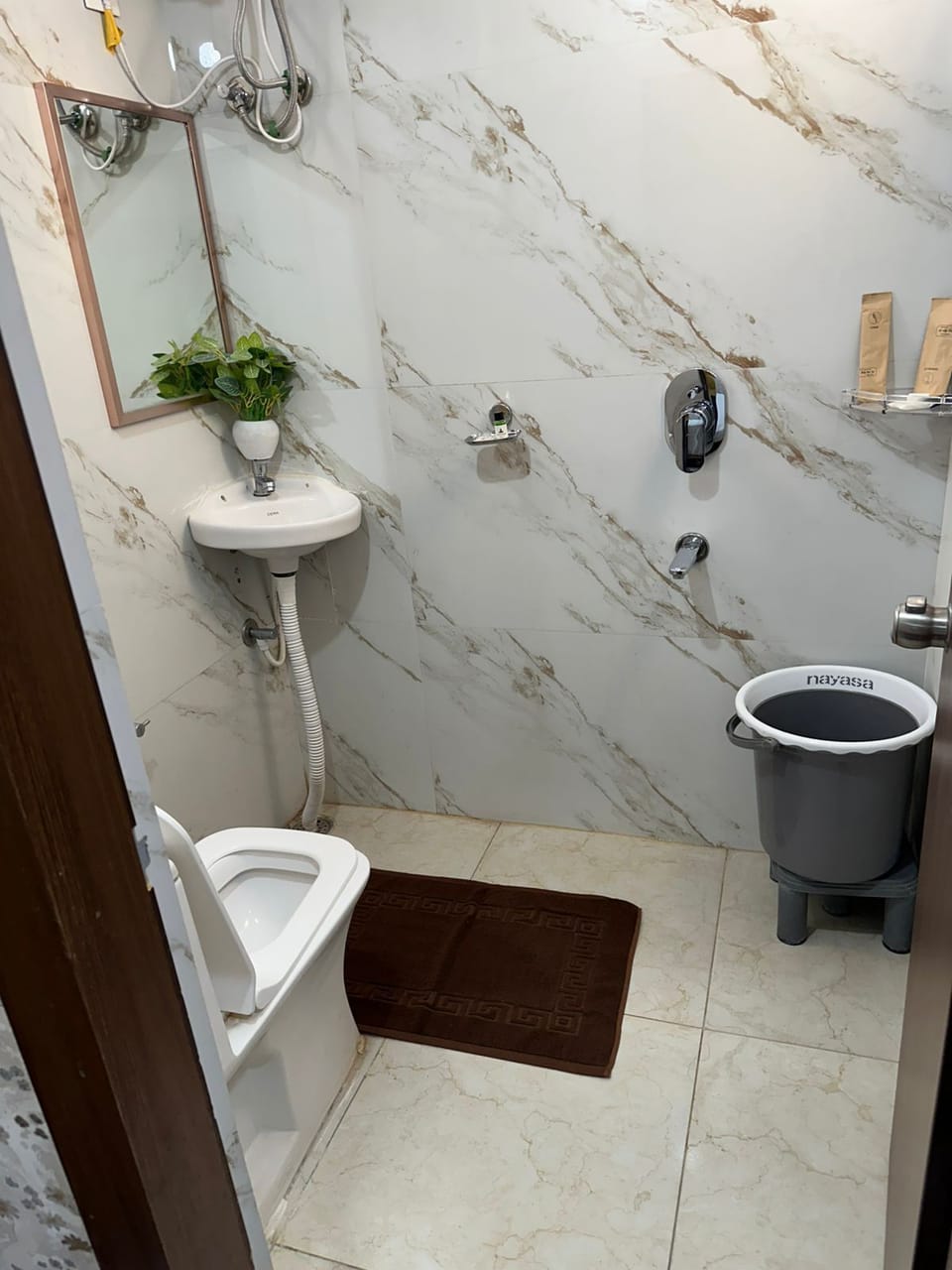 Double Room, City View | Bathroom | Shower, free toiletries, hair dryer, slippers