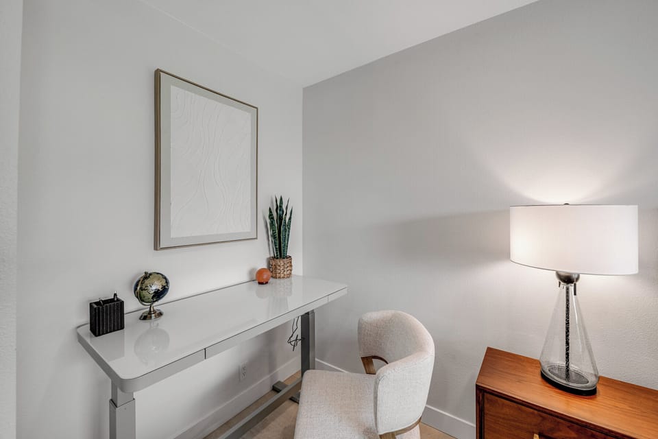 Dedicated workspace with height adjustable desk!