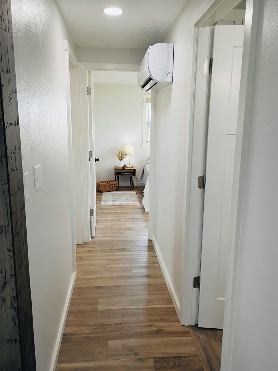 Bedroom one and two are located at the end of the hallway