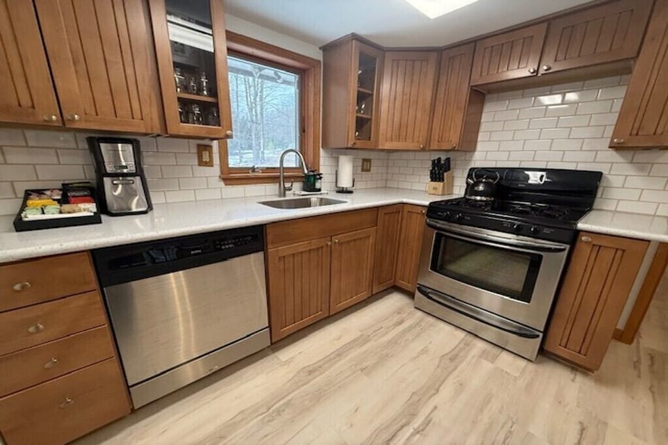 Fully renovated kitchen with modern finishes and open layout