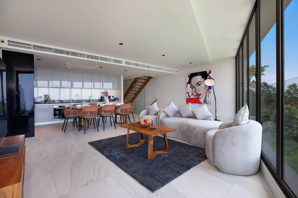 Exclusive Condo, 3 Bedrooms, Ocean View | Living room | Flat-screen TV