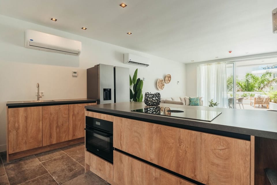 Whipping up something delicious in this bright and airy kitchen!