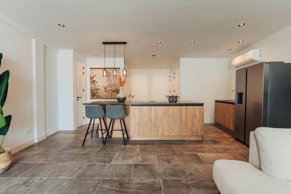 This kitchen is so inviting! Perfect for cooking up a storm and making memories.