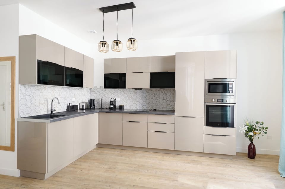 Deluxe Apartment, 1 Queen Bed, Kitchen | Private kitchen | Espresso maker, full-size fridge, microwave, oven