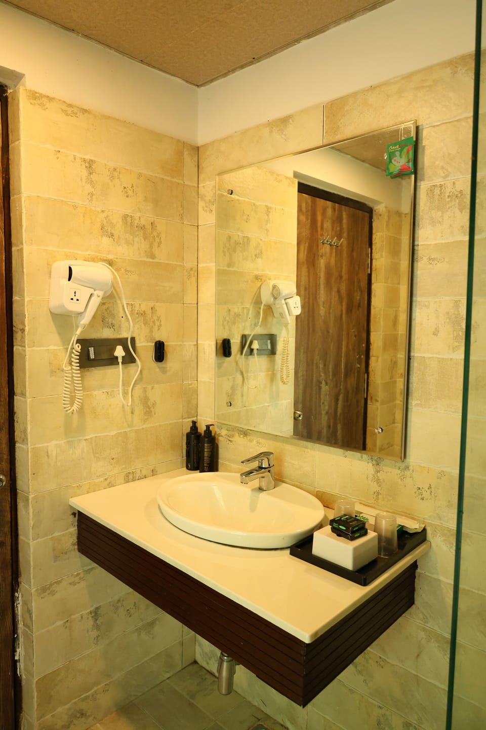 Pebble Path Cottages | Bathroom | Slippers, towels