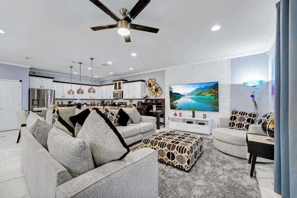 Spacious living area with cozy seating and a welcoming vibe.