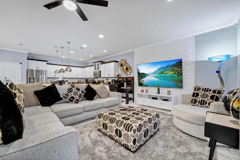 Spacious living area with cozy seating and a welcoming vibe.